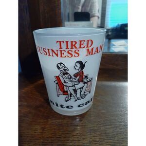 Vintage mid-century modern whiskey cocktail glass tired business man